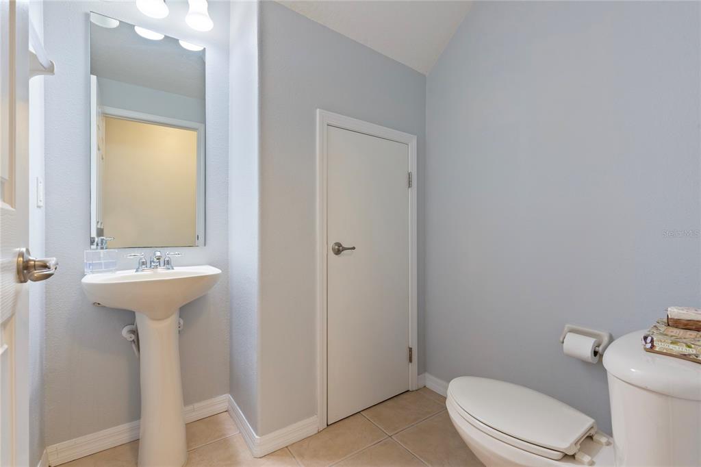10901 Brickside Court Riverview, FL 33579 - Photo 13 of 36 a bathroom with a sink toilet