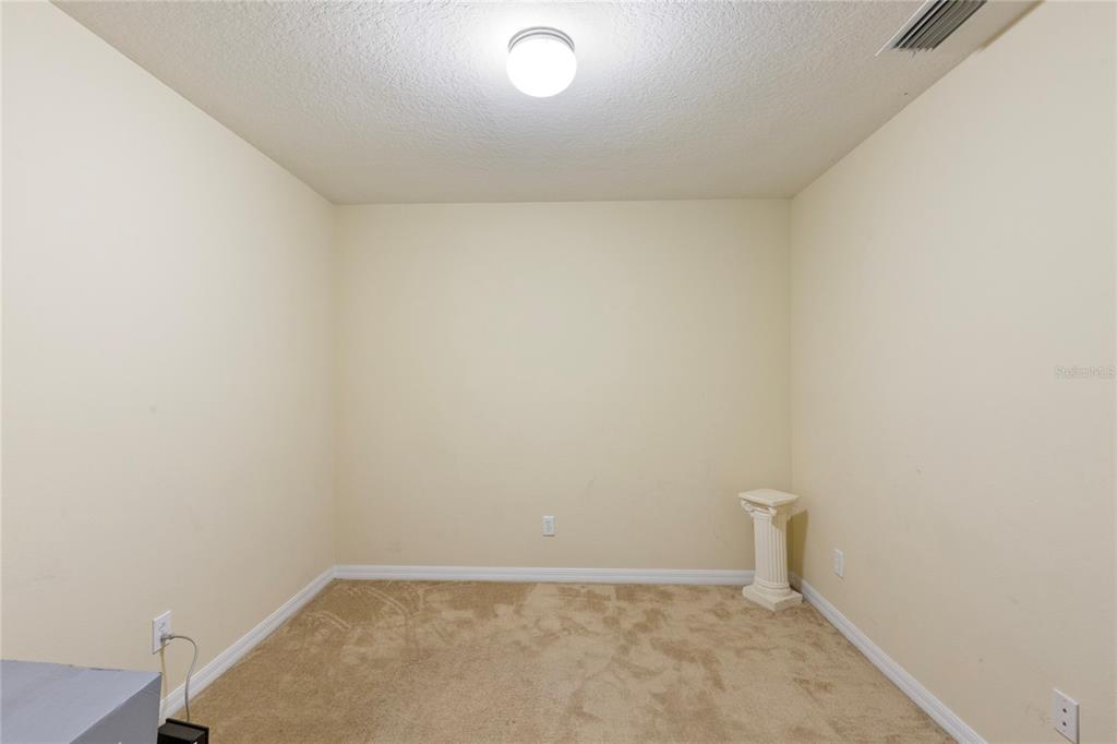 10901 Brickside Court Riverview, FL 33579 - Photo 26 of 36 a view of an empty room
