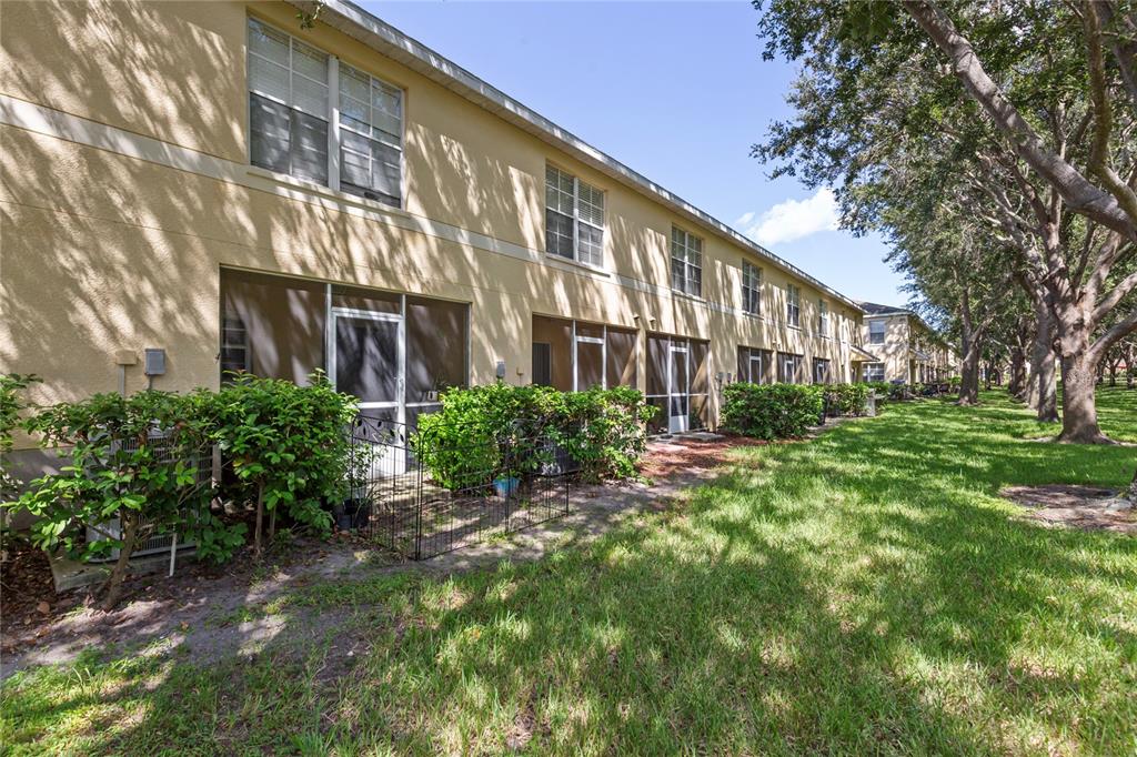 10901 Brickside Court Riverview, FL 33579 - Photo 29 of 36 a view of a building with a yard