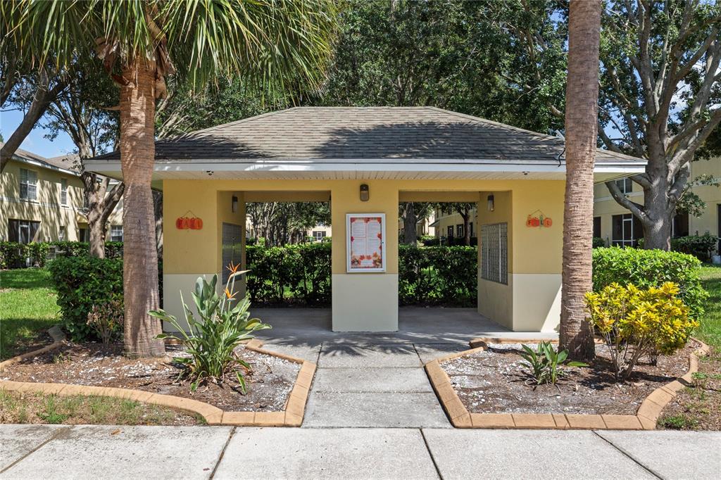 10901 Brickside Court Riverview, FL 33579 - Photo 31 of 36 a front view of a house with garden