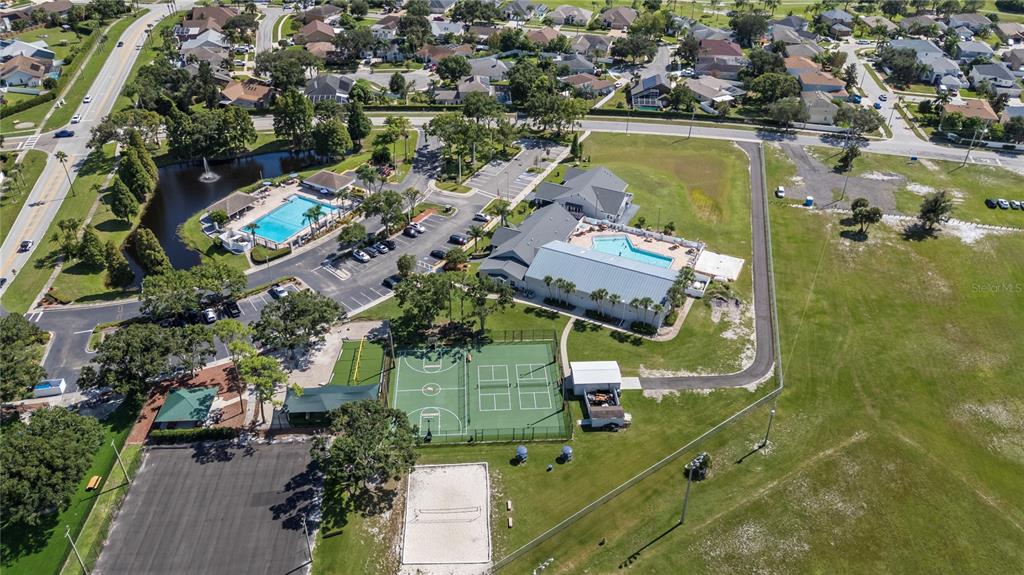 10901 Brickside Court Riverview, FL 33579 - Photo 34 of 36 an aerial view of a house with a lake view