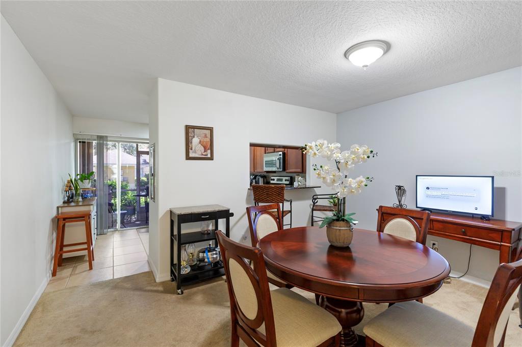 10901 Brickside Court Riverview, FL 33579 - Photo 8 of 36 a view of a dining room with furniture