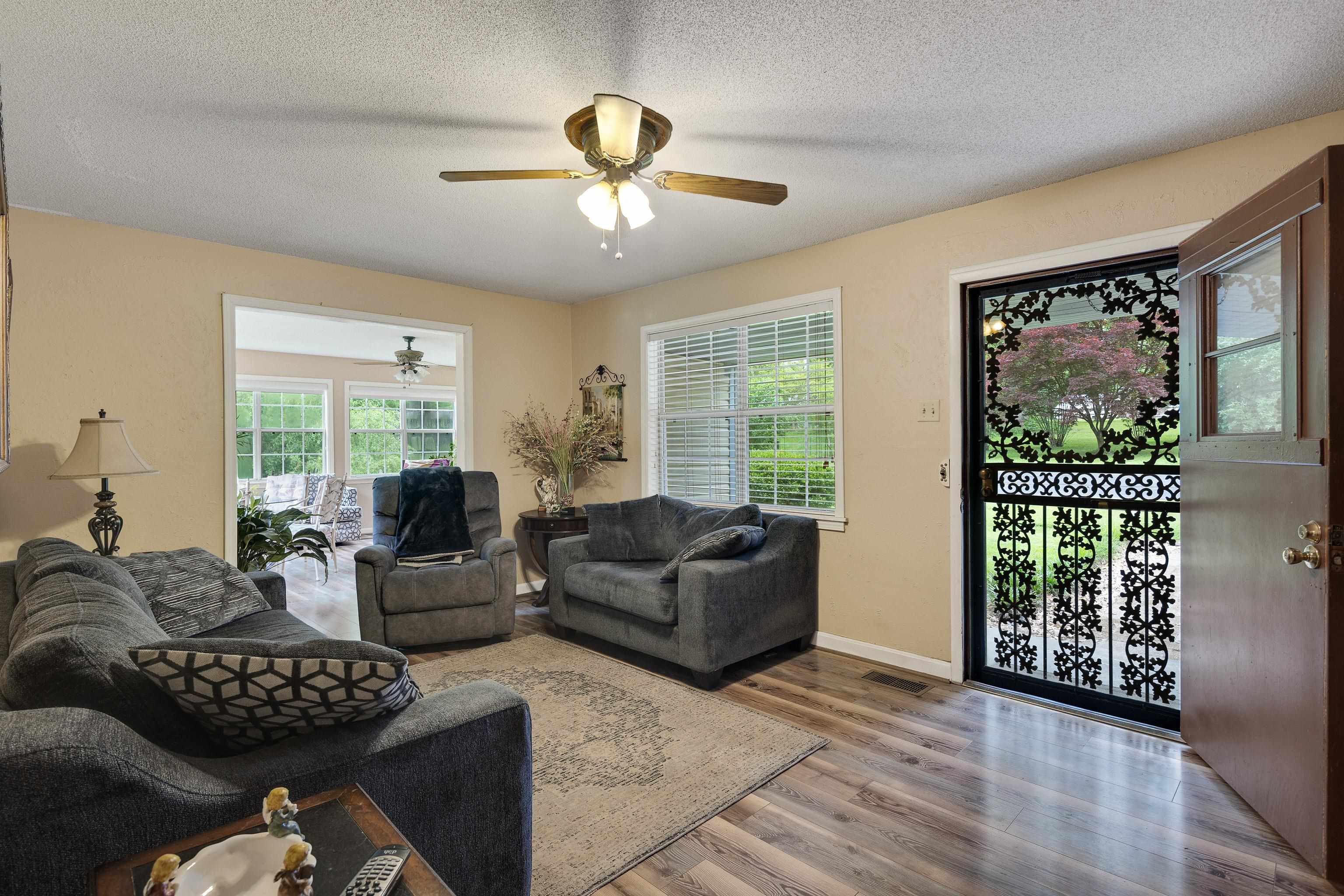9252 Brunswick Road Millington, TN 38053 - Photo 12 of 40 a living room with furniture and a large window