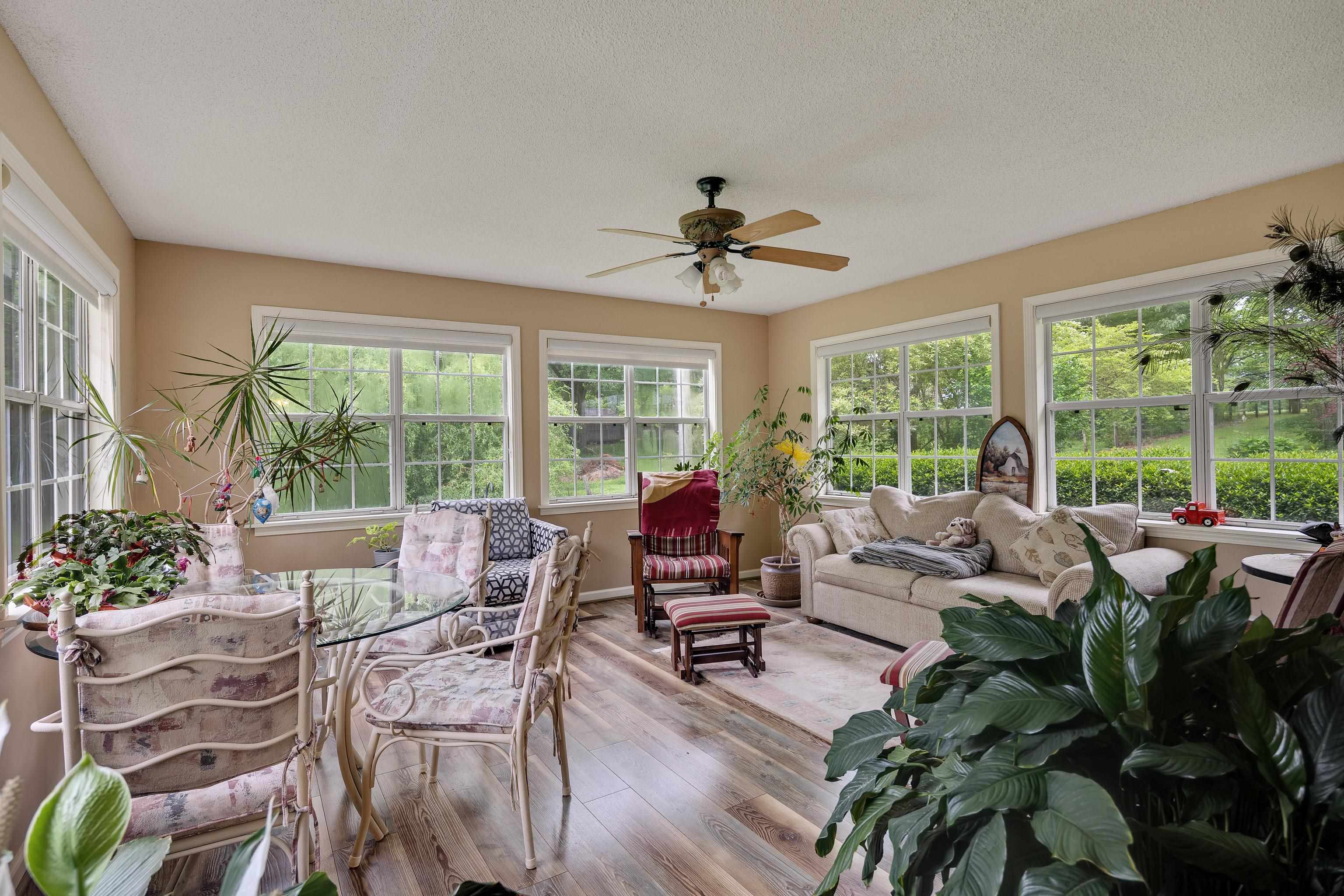 9252 Brunswick Road Millington, TN 38053 - Photo 13 of 40 a living room with furniture and a large window
