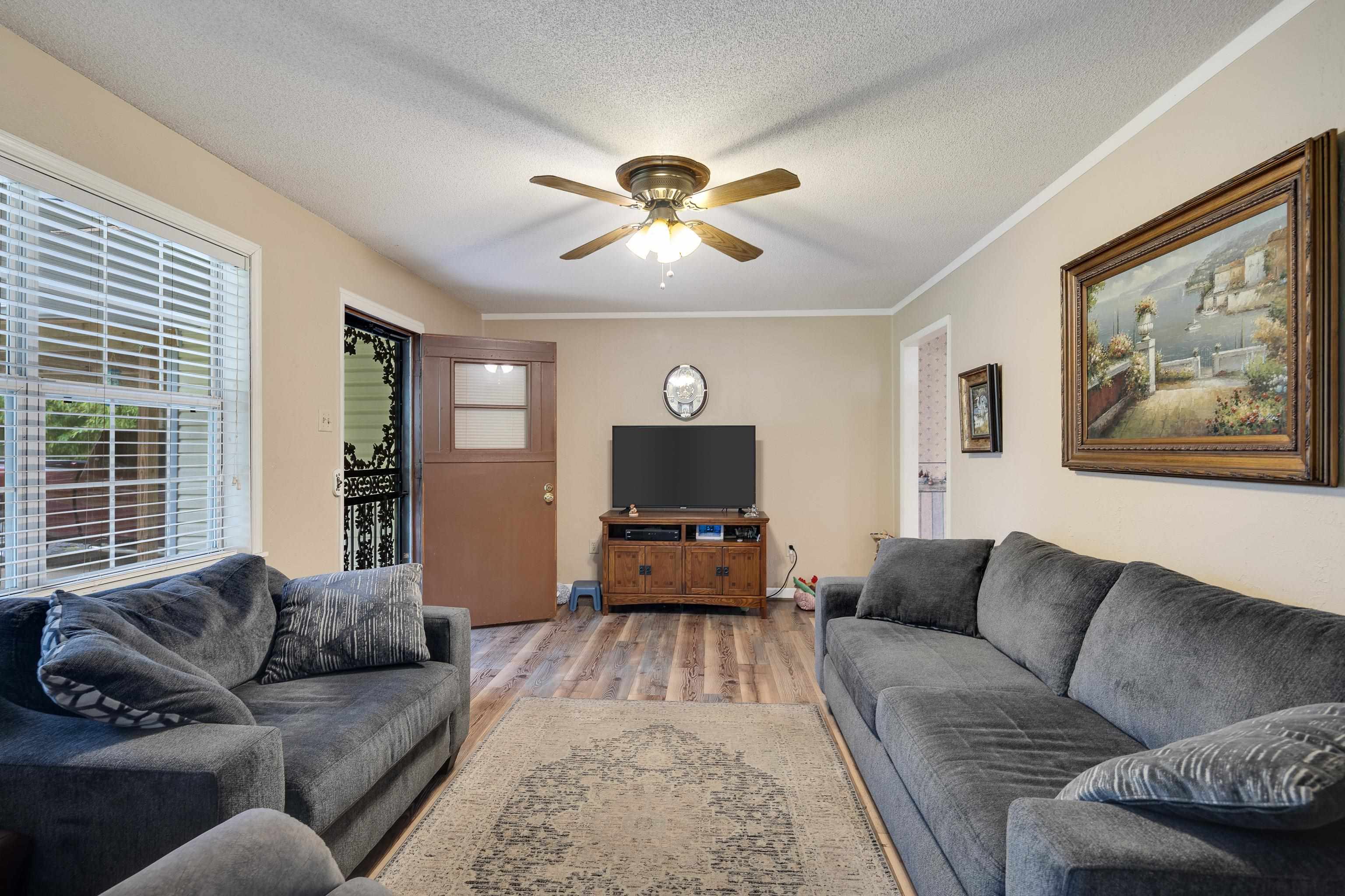 9252 Brunswick Road Millington, TN 38053 - Photo 14 of 40 a living room with furniture and a large window