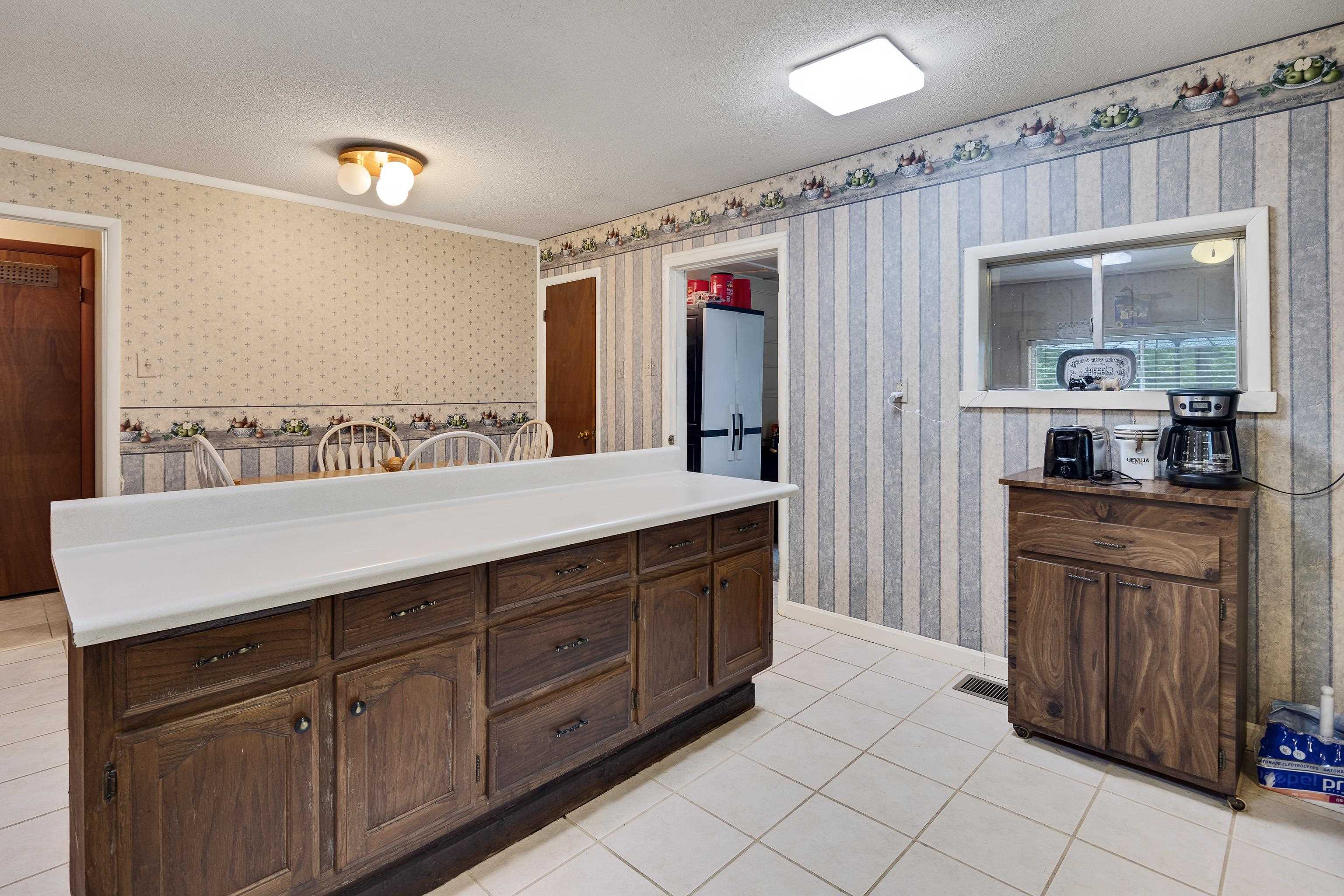 9252 Brunswick Road Millington, TN 38053 - Photo 19 of 40 a bathroom with a sink a mirror and a shower