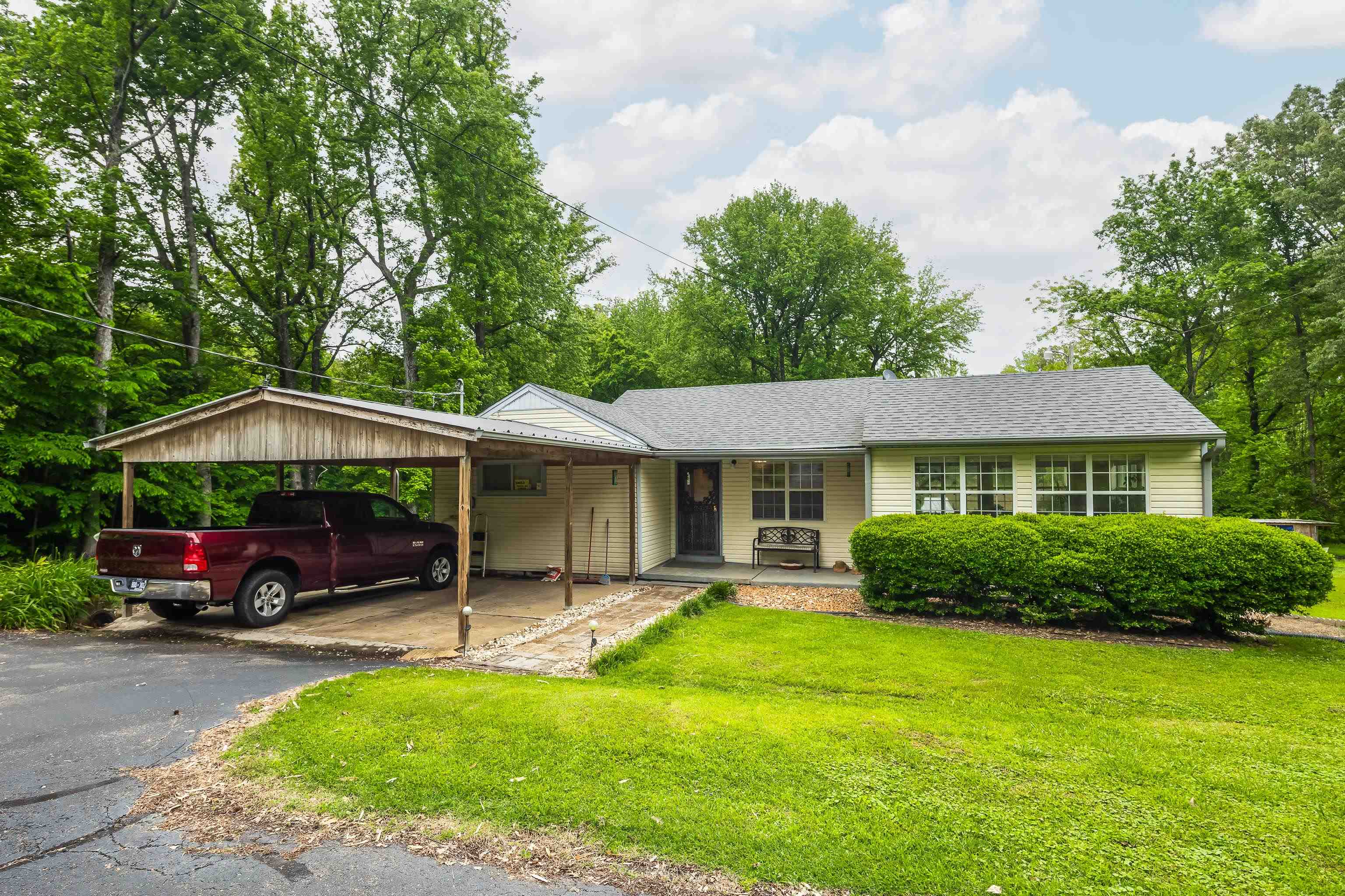 9252 Brunswick Road Millington, TN 38053 - Photo 10 of 40 a house view with a garden space