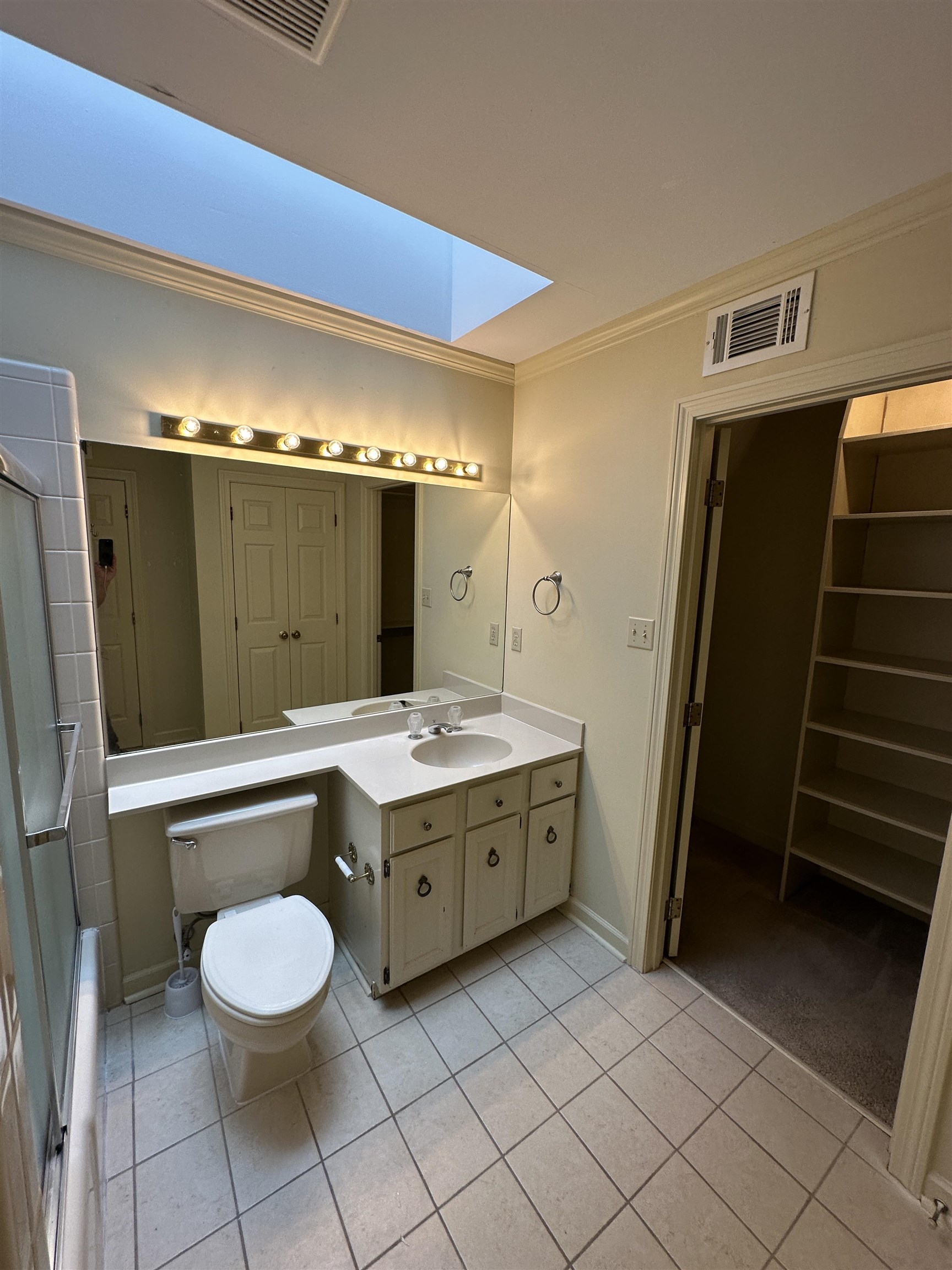 320 River Oaks Road North Memphis, TN 38120 - Photo 19 of 21 a bathroom with a granite countertop sink toilet and mirror