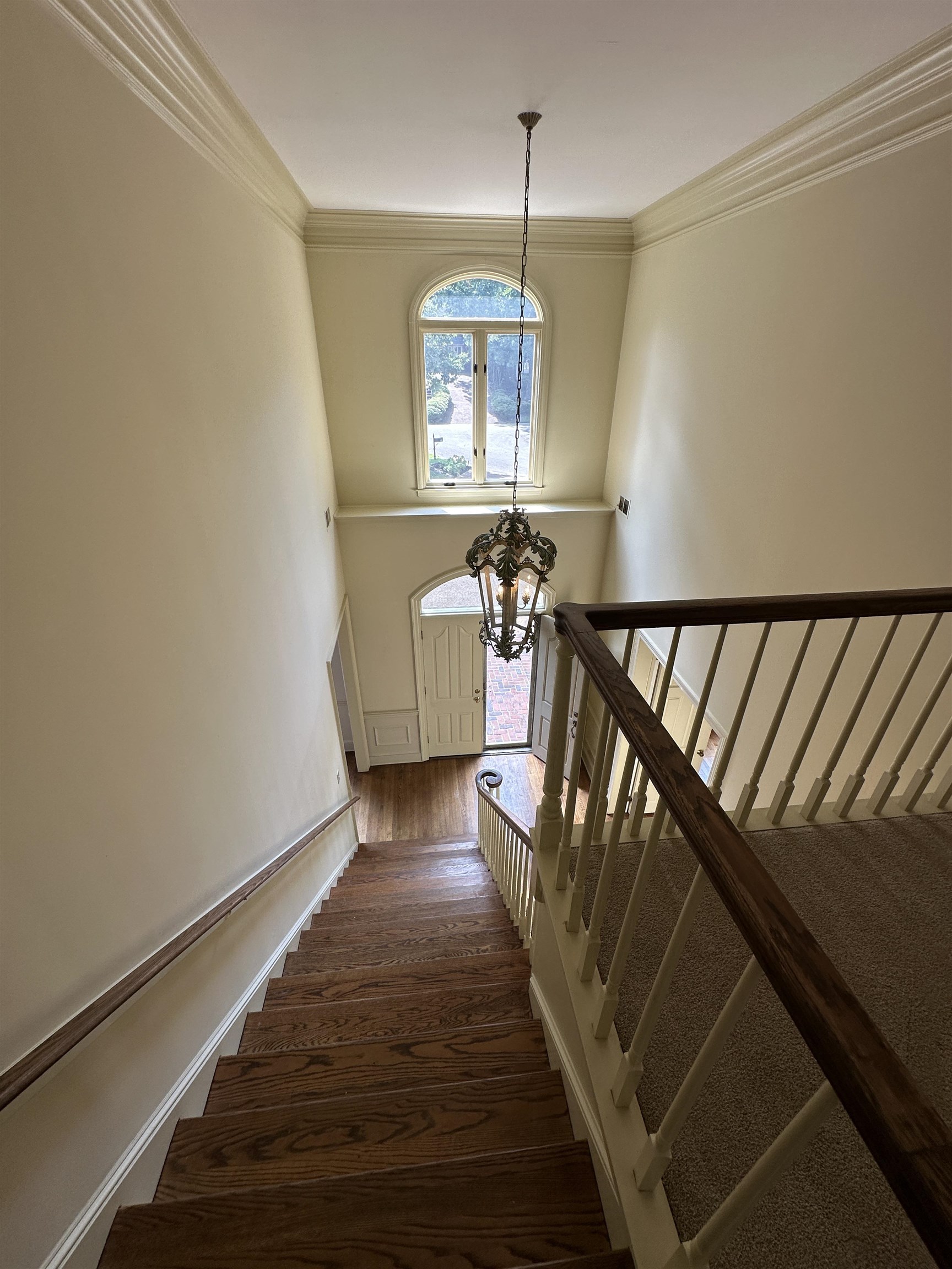 320 River Oaks Road North Memphis, TN 38120 - Photo 20 of 21 a view of a hallway with wooden floor and staircase