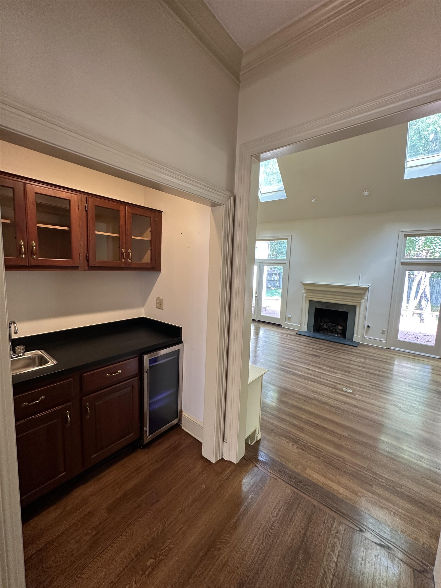 320 River Oaks Road North Memphis, TN 38120 - Photo 5 of 21 a kitchen with stainless steel appliances wooden cabinets and a stove top oven