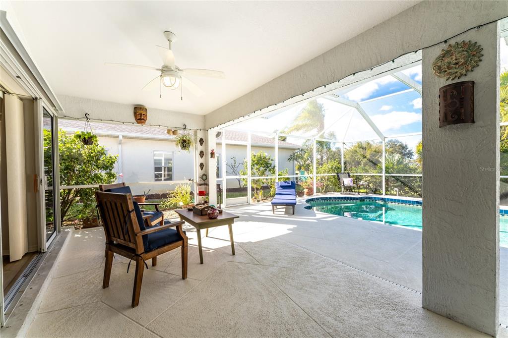443 Rotonda Circle Rotonda West, FL 33947 - Photo 42 of 59 a view of a porch with furniture and garden
