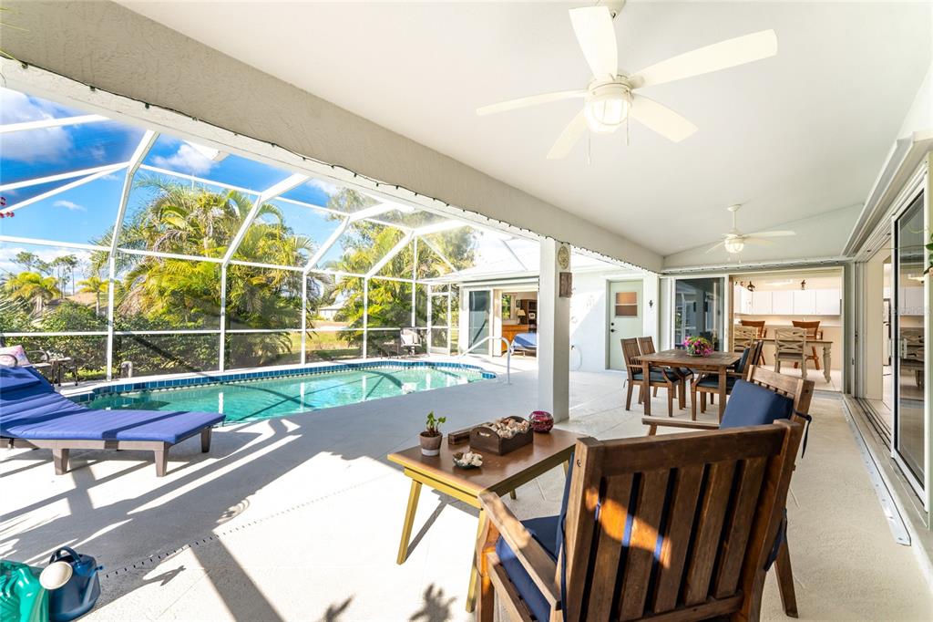 443 Rotonda Circle Rotonda West, FL 33947 - Photo 43 of 59 a view of a dining room with furniture window and outside view
