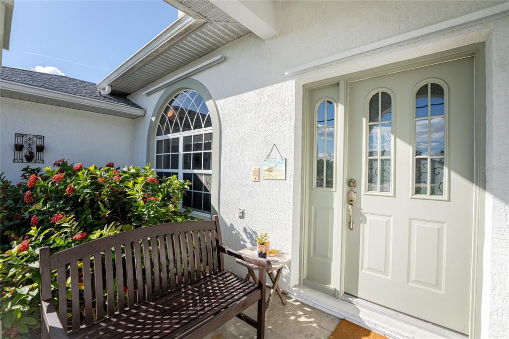 443 Rotonda Circle Rotonda West, FL 33947 - Photo 8 of 59 a view of entryway with wooden floor