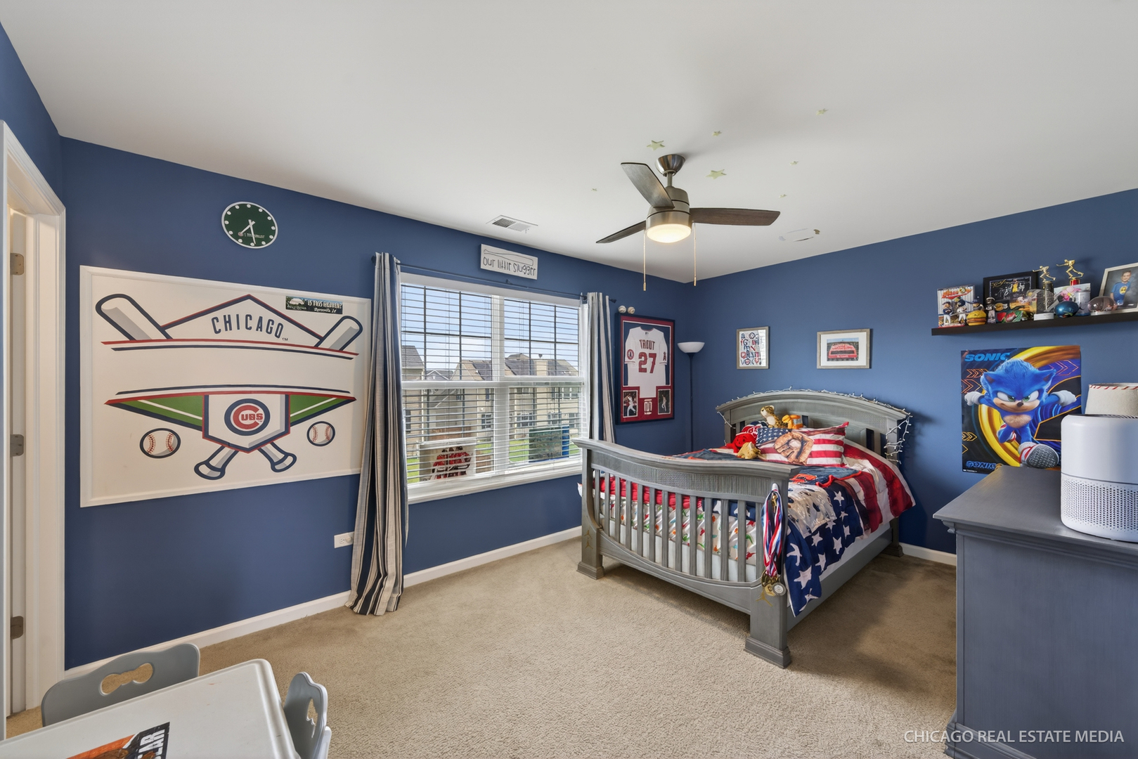 295 Monarch Lane Volo, IL 60020 - Photo 20 of 36 a bedroom with furniture and a window