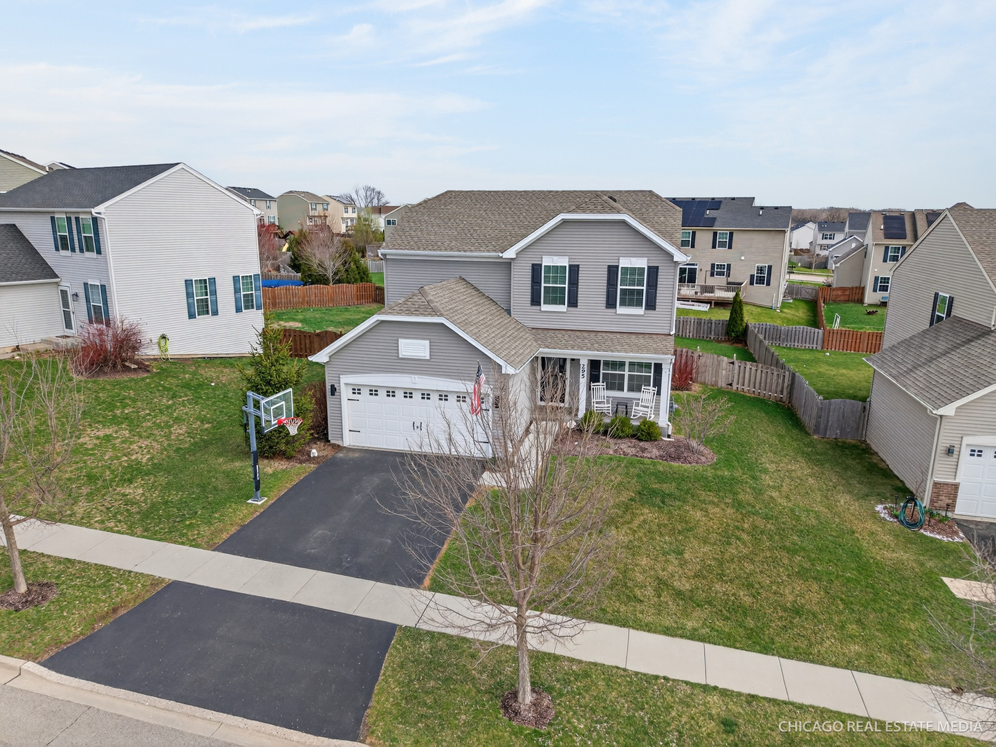 295 Monarch Lane Volo, IL 60020 - Photo 2 of 36 a front view of a house with a yard