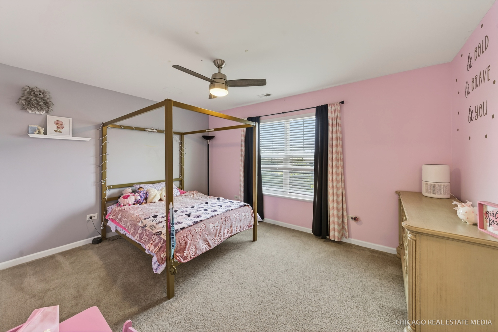 295 Monarch Lane Volo, IL 60020 - Photo 22 of 36 a bedroom with a bed and a table