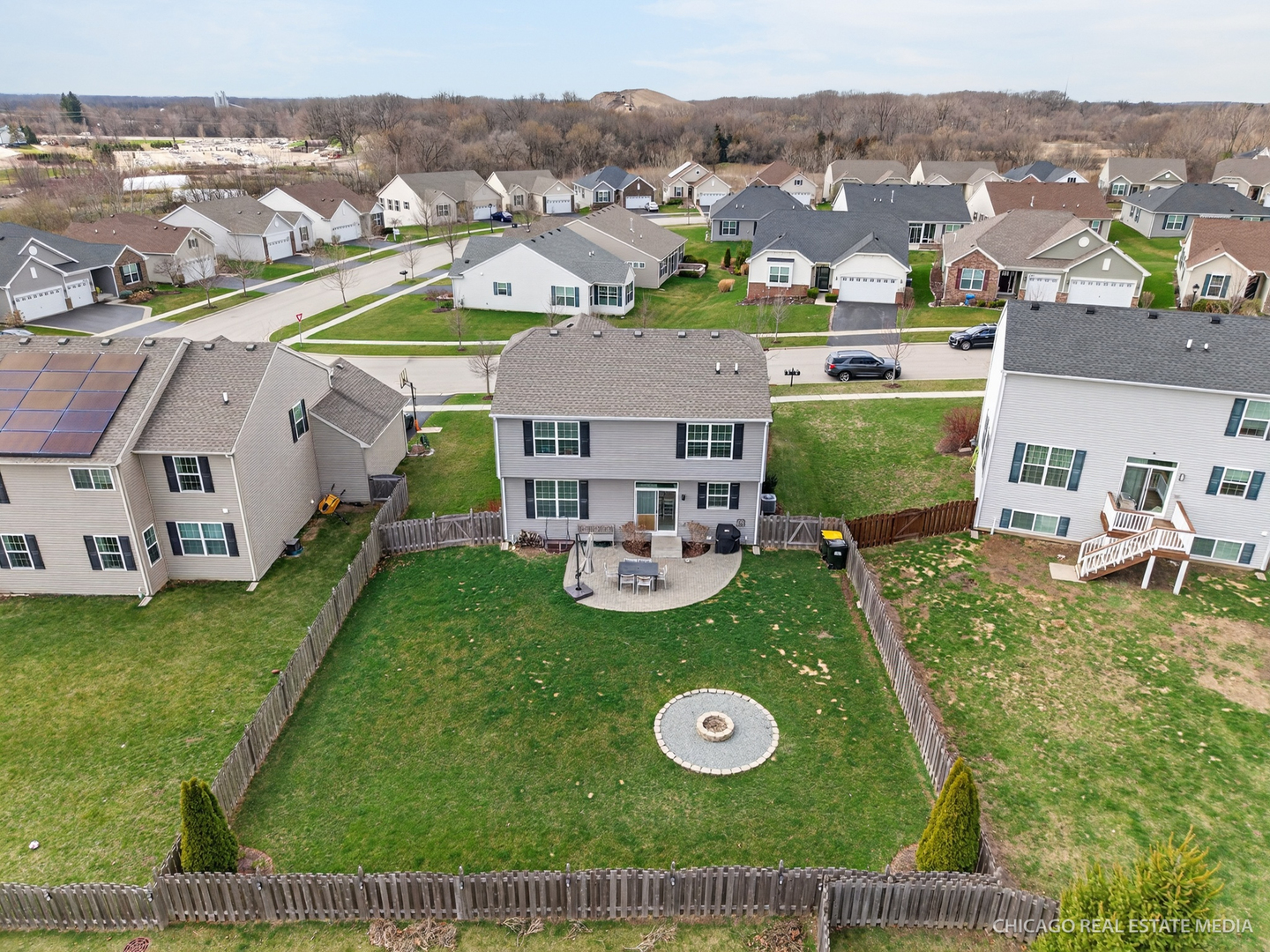 295 Monarch Lane Volo, IL 60020 - Photo 32 of 36 an aerial view of residential houses with outdoor space and swimming pool
