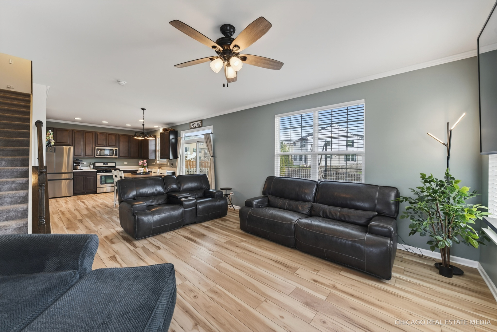 295 Monarch Lane Volo, IL 60020 - Photo 8 of 36 a living room with furniture and a large window