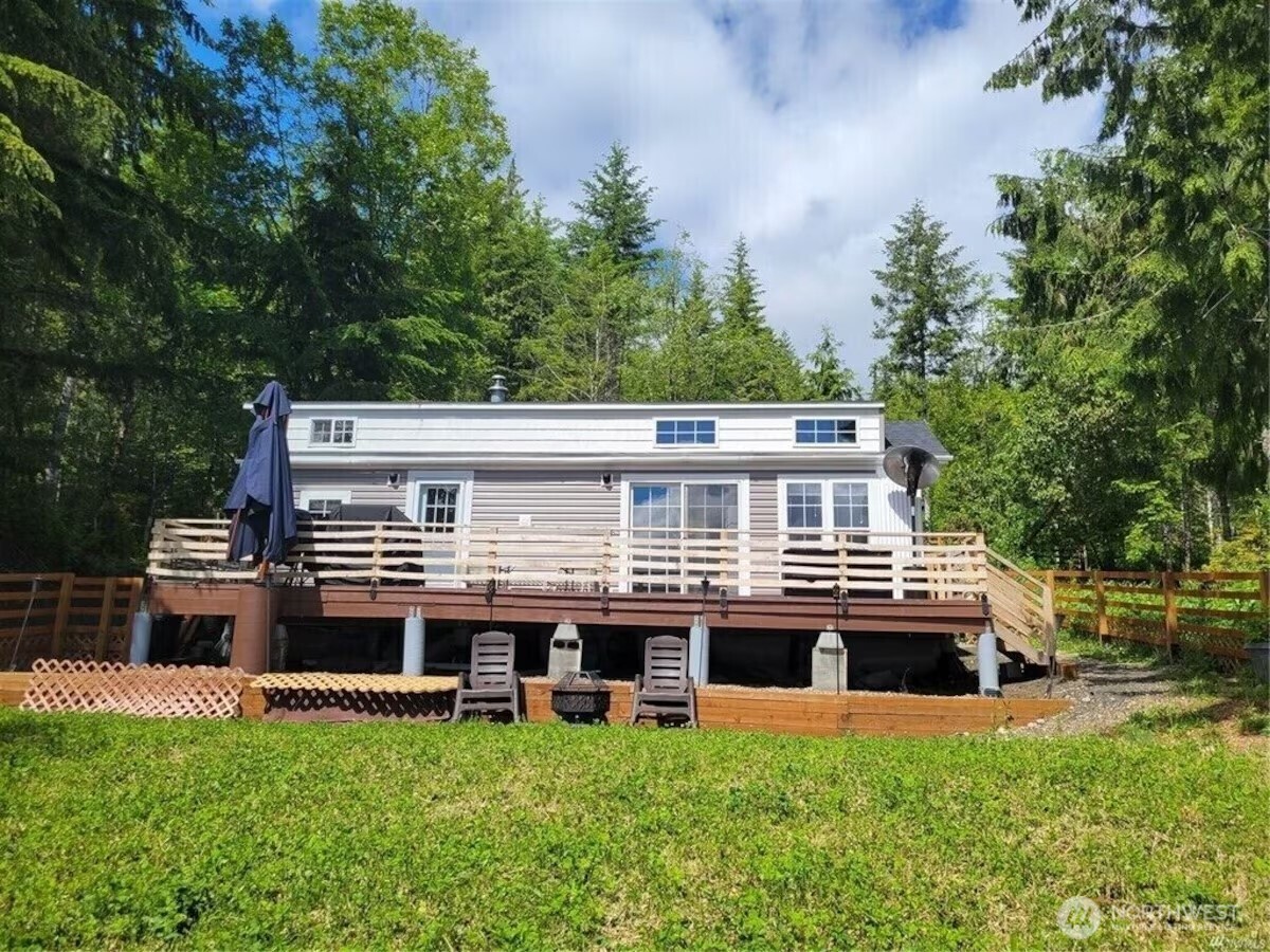 50 North Rustic Ridge Drive Lilliwaup, WA 98555 - Photo 19 of 40 a house view with a garden space