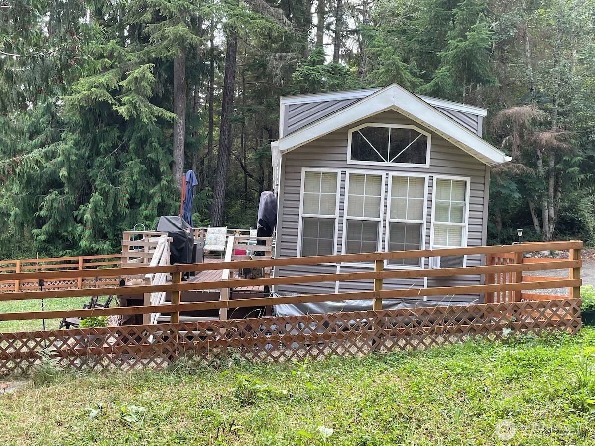 50 North Rustic Ridge Drive Lilliwaup, WA 98555 - Photo 6 of 40 a view of a house with a yard