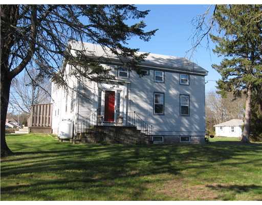 Exterior Front. This two unit dwelling is in a quiet neighborhood close the the Yacht Club.