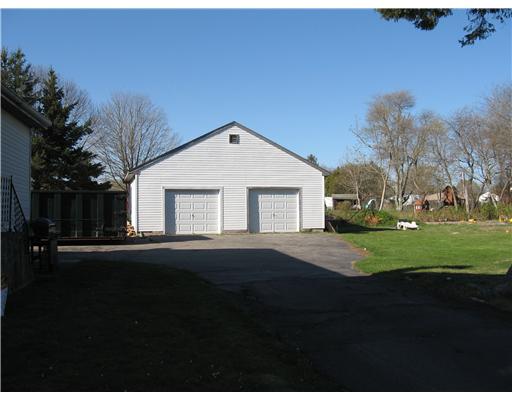 22 Babcock Road Westerly, RI 02891 - Photo 2 of 12 Parking Lot/Garage. The spacious 2 car detached garage has wonderful storage that is easily accessible by an interior stairway.