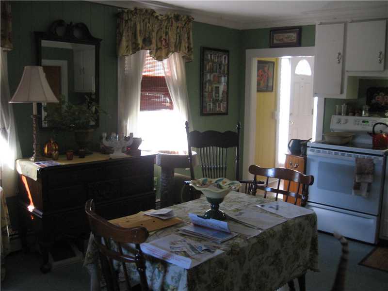 22 Babcock Road Westerly, RI 02891 - Photo 5 of 12 Kitchen. This cozy, eat-in-kitchen is featured in the smaller apartment.