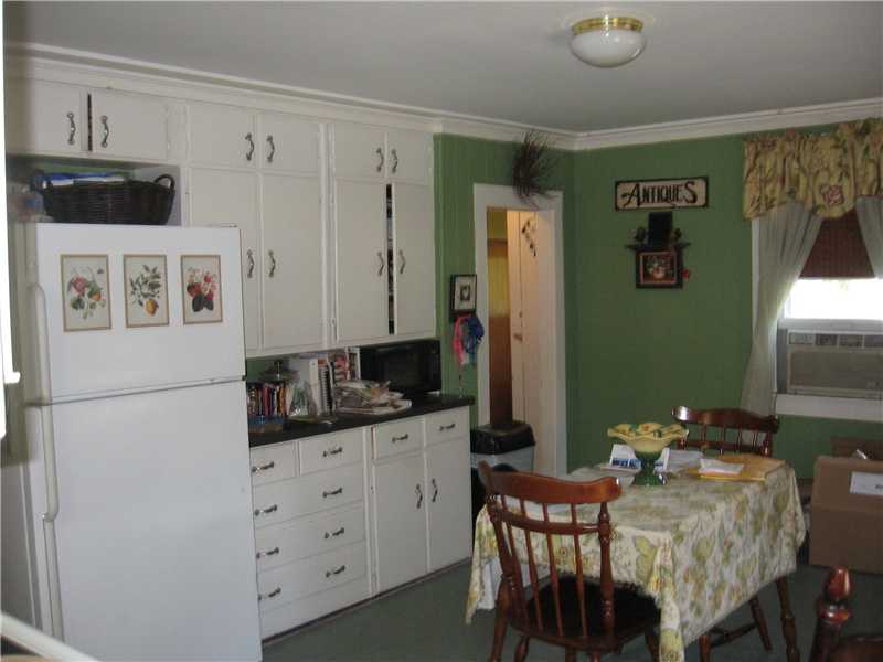 22 Babcock Road Westerly, RI 02891 - Photo 6 of 12 Kitchen. The kitchen in the smaller apartment offers plenty of counter and cupboard space.