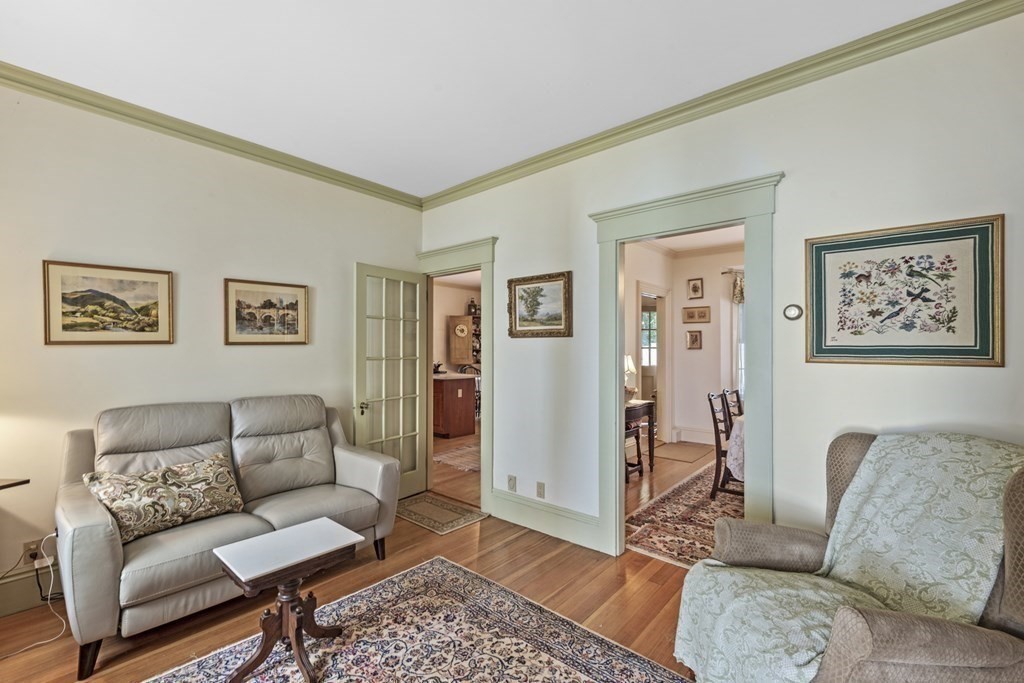 42 Willow Street Reading, MA 01867 - Photo 12 of 35 a living room with furniture and a couch