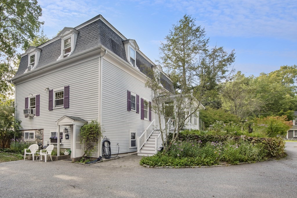 42 Willow Street Reading, MA 01867 - Photo 35 of 35 a view of a house with a street