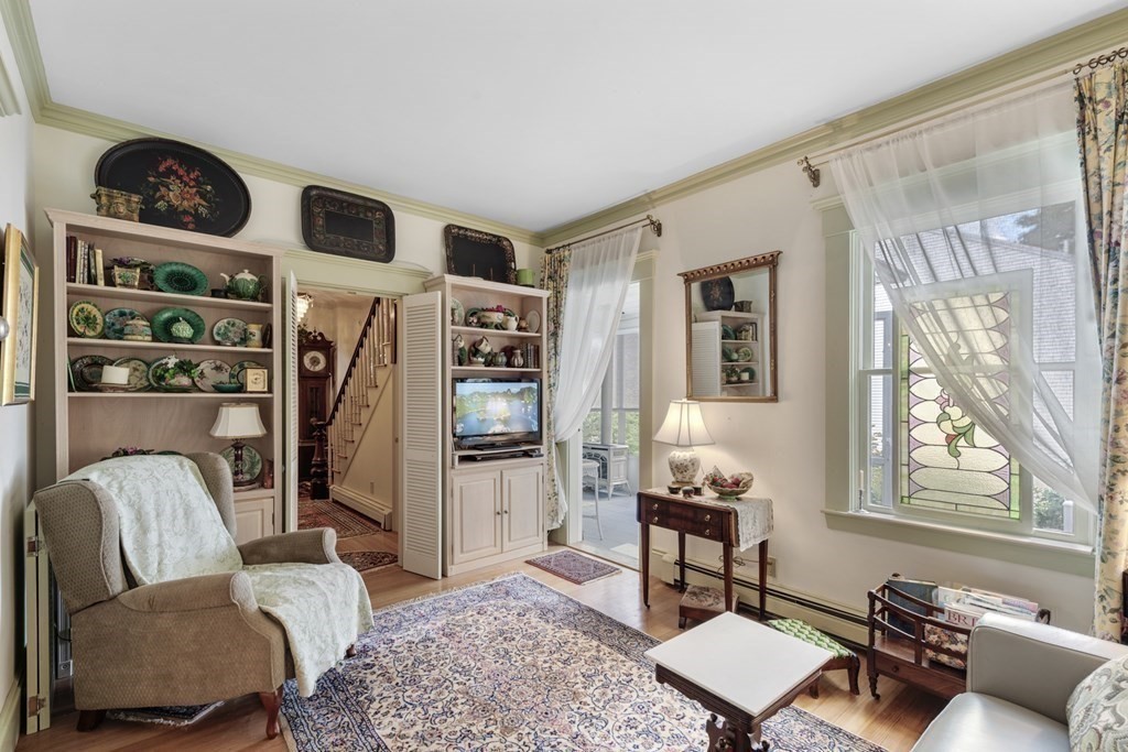 42 Willow Street Reading, MA 01867 - Photo 10 of 35 a living room with furniture and a window