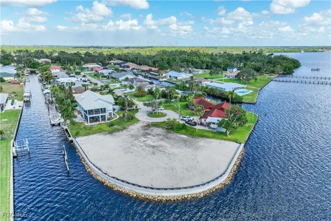 a view of a lake with a yard