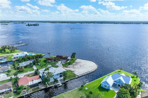 a view of a lake with a swimming pool