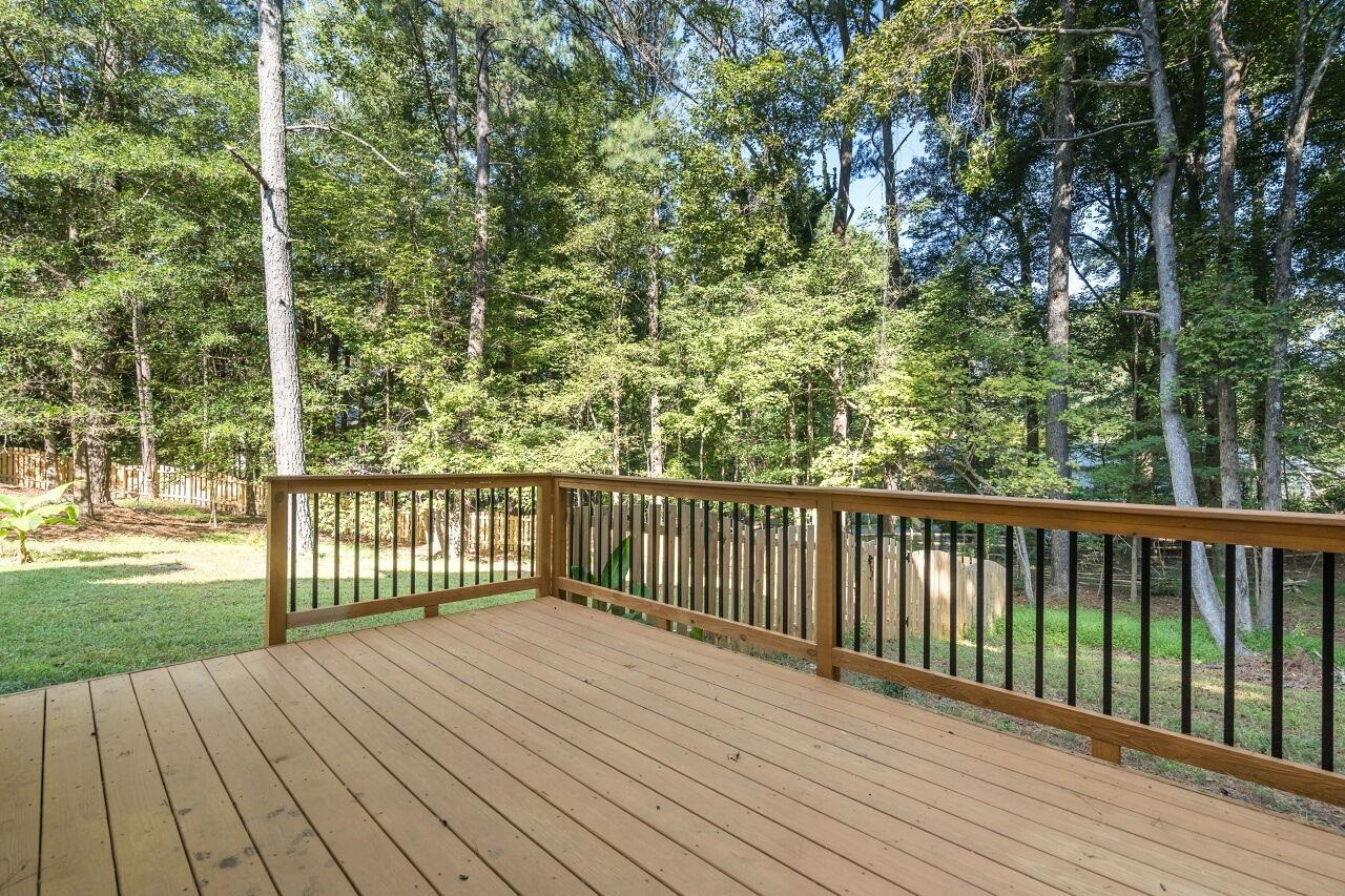 9801 Pine Meadow Lane Raleigh, NC 27615 - Photo 27 of 43 a view of balcony with wooden floor