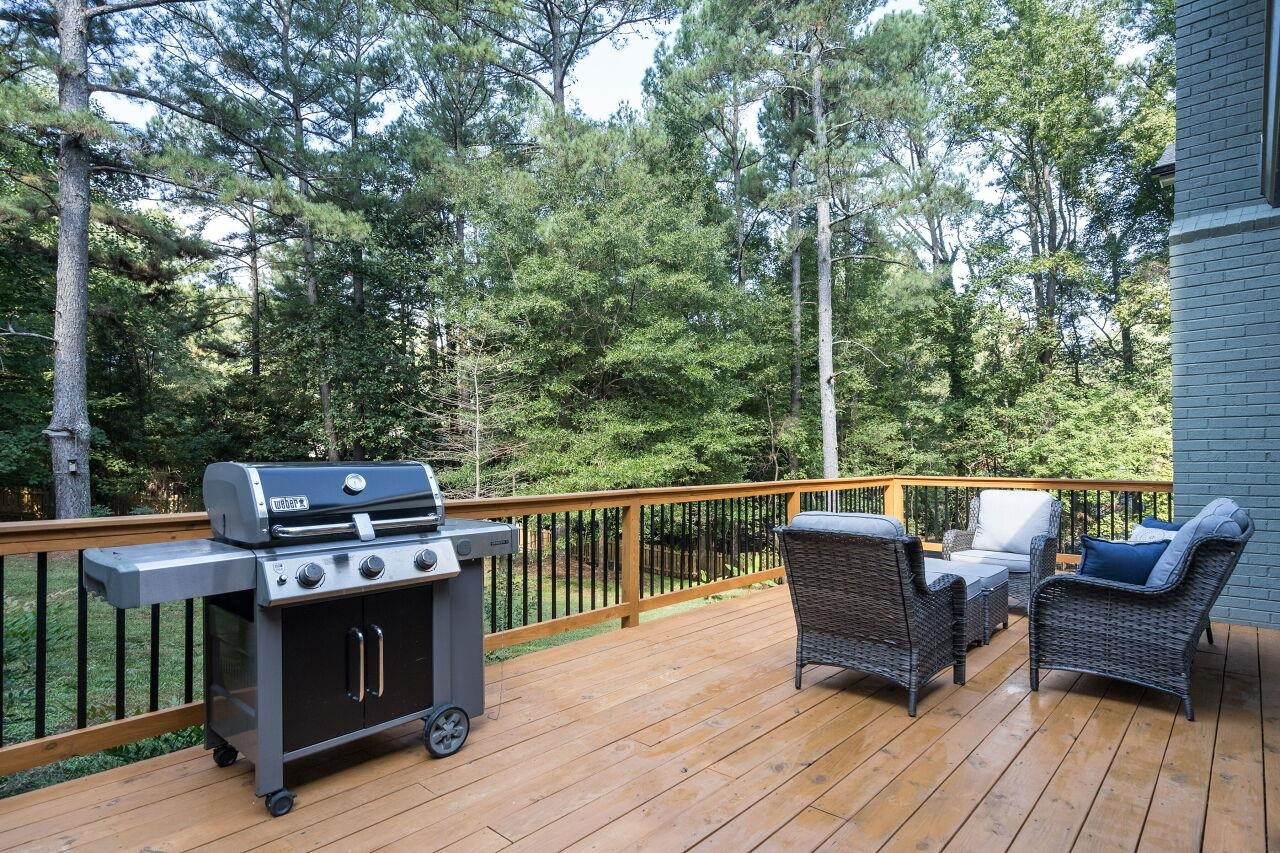 9801 Pine Meadow Lane Raleigh, NC 27615 - Photo 29 of 43 a view of a roof deck with furniture