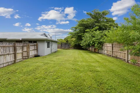 a view of a backyard with a garden