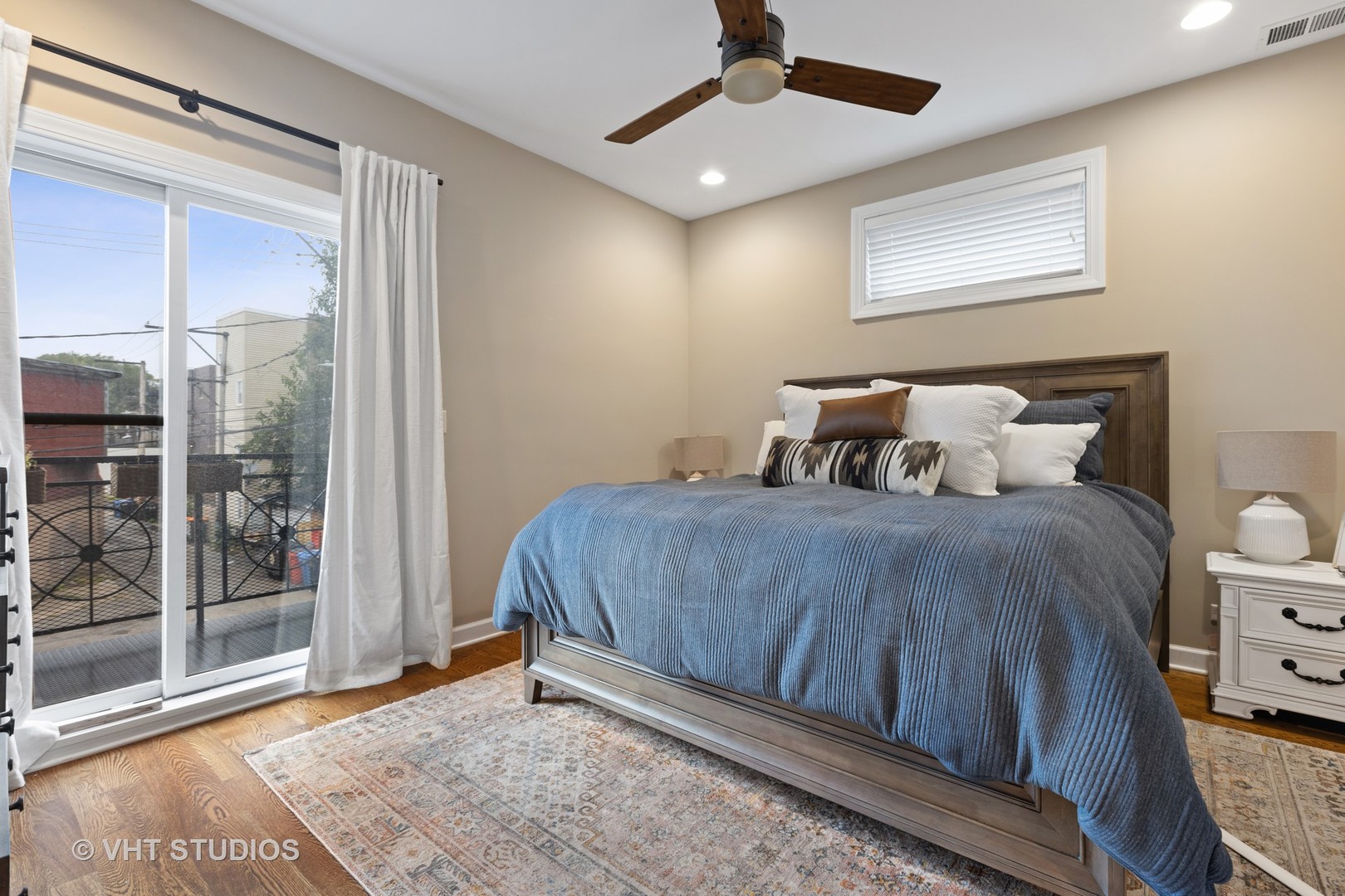 2112 West Rice Street, Unit 2 Chicago, IL 60622 - Photo 12 of 16 a bedroom with a bed and window