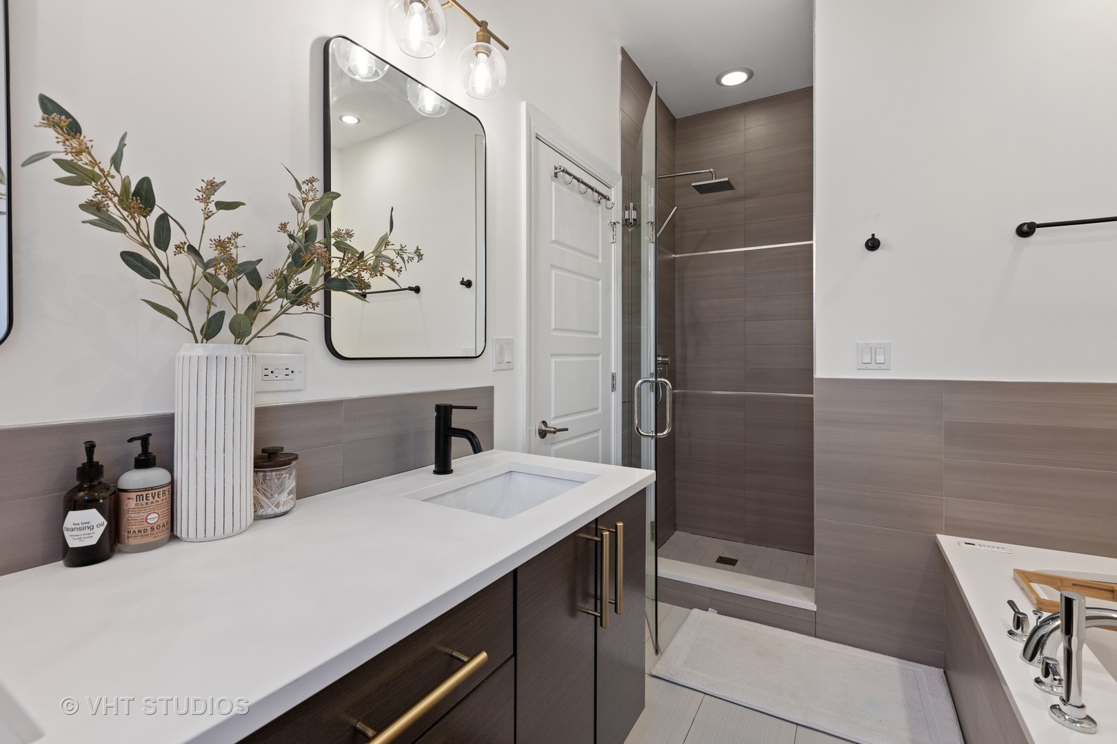 2112 West Rice Street, Unit 2 Chicago, IL 60622 - Photo 15 of 16 a bathroom with a sink and a mirror