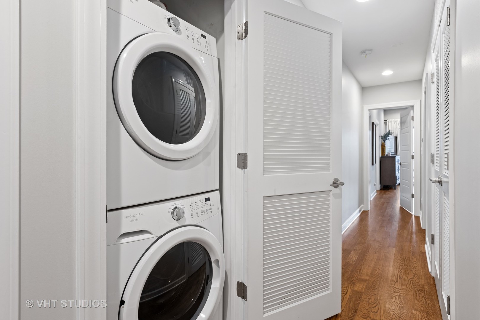 2112 West Rice Street, Unit 2 Chicago, IL 60622 - Photo 16 of 16 a view of a hallway with washer and dryer