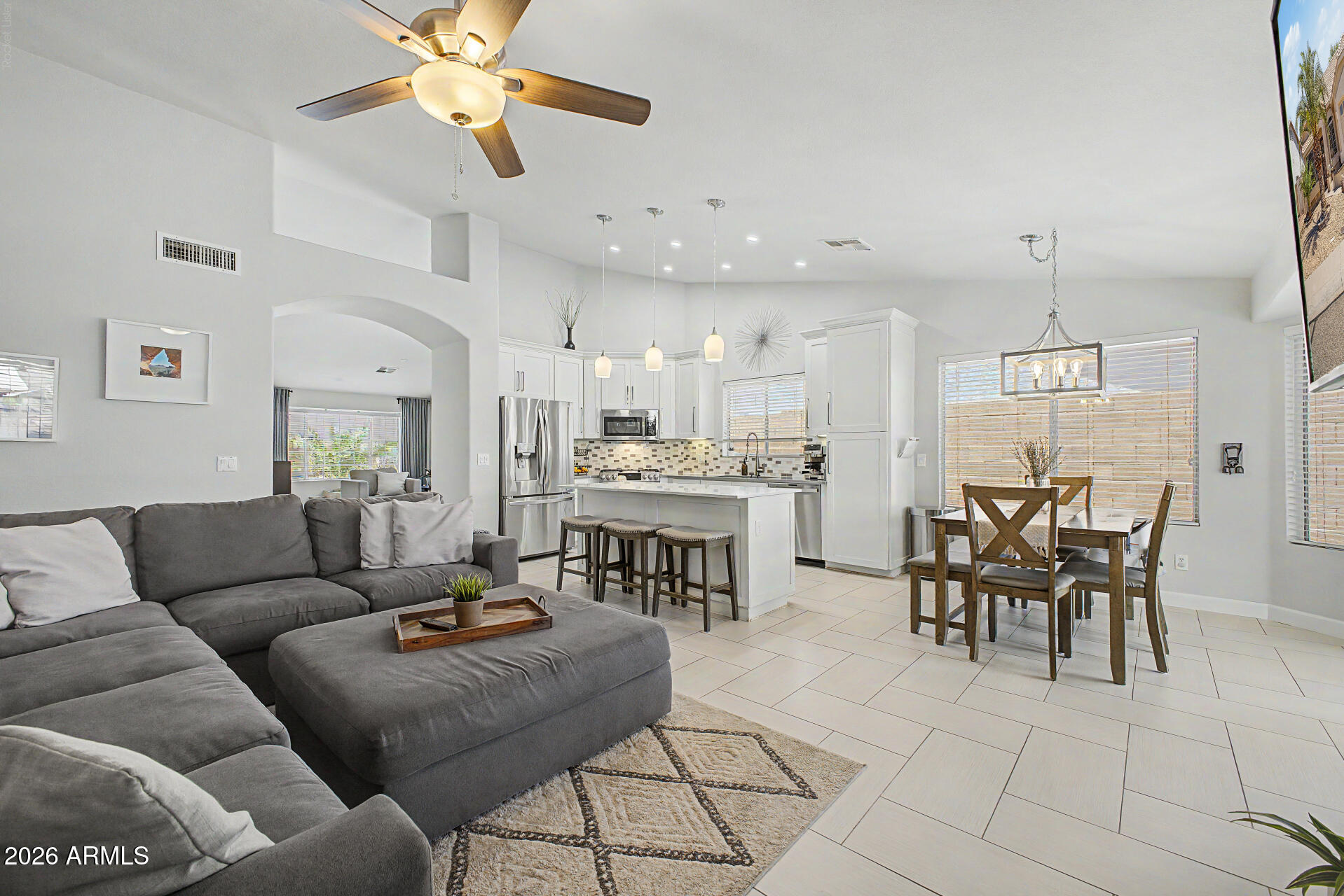 5975 West Alameda Road Glendale, AZ 85310 - Photo 1 of 49 Family room & kitchen