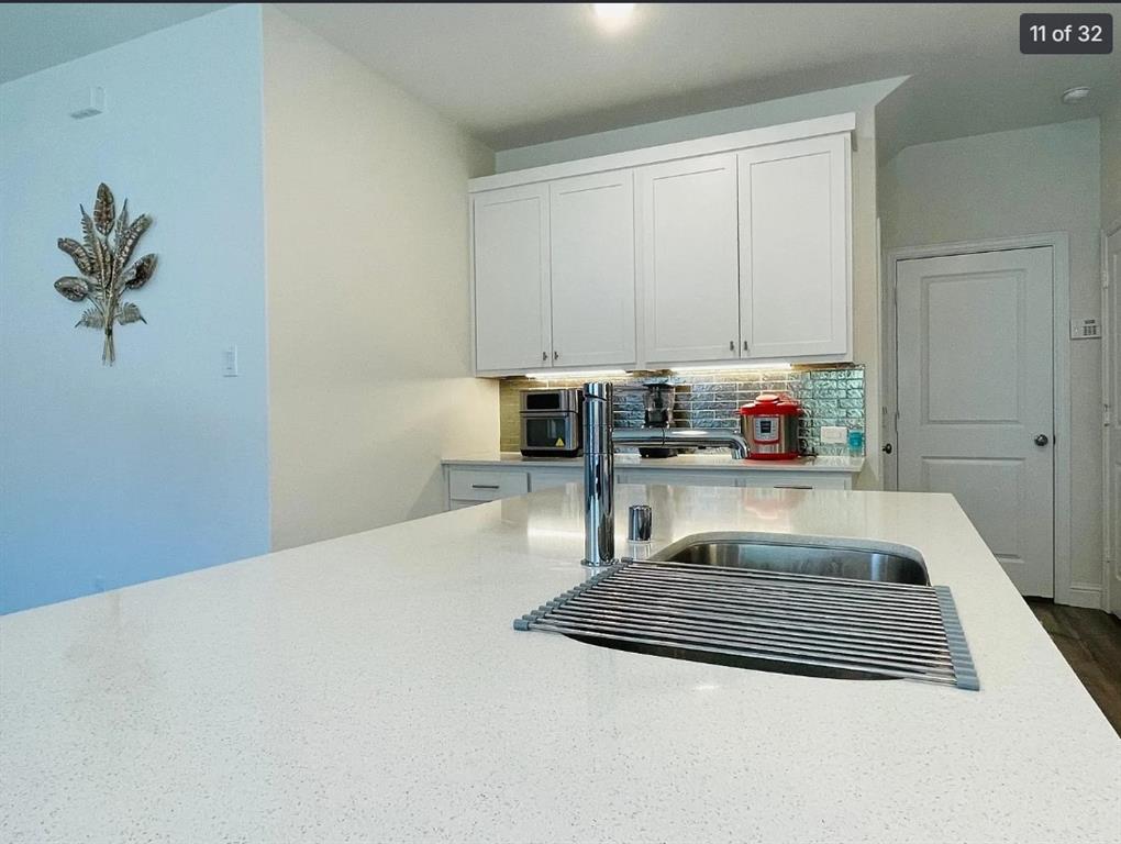 1009 Emil Place Allen, TX 75013 - Photo 11 of 31 a view of kitchen and sink