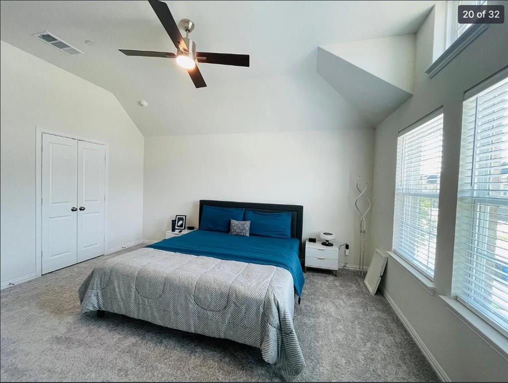 1009 Emil Place Allen, TX 75013 - Photo 19 of 31 a bedroom with a bed and a window