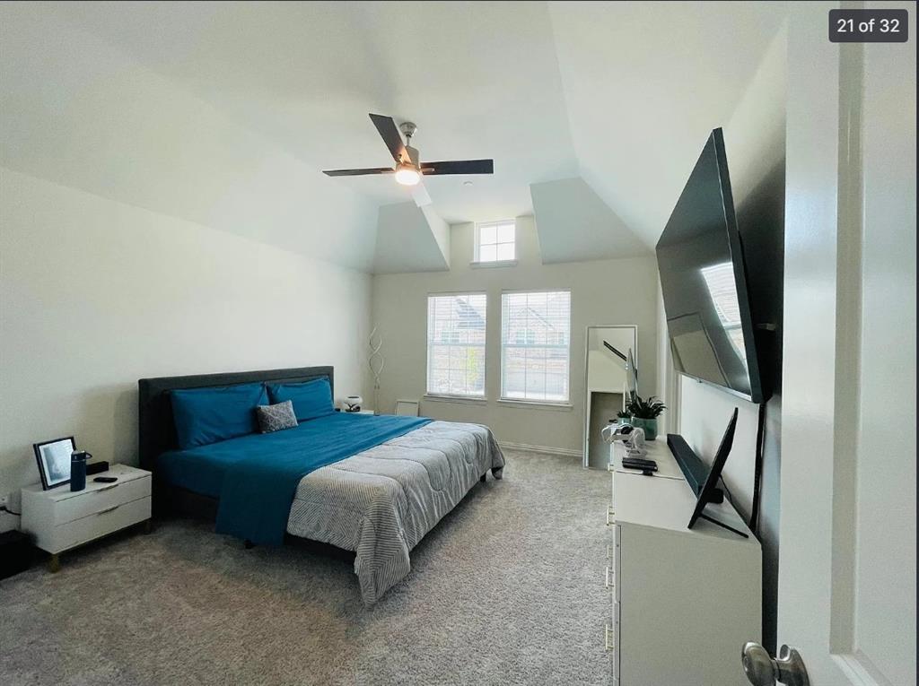 1009 Emil Place Allen, TX 75013 - Photo 20 of 31 a bedroom with bed tv and window