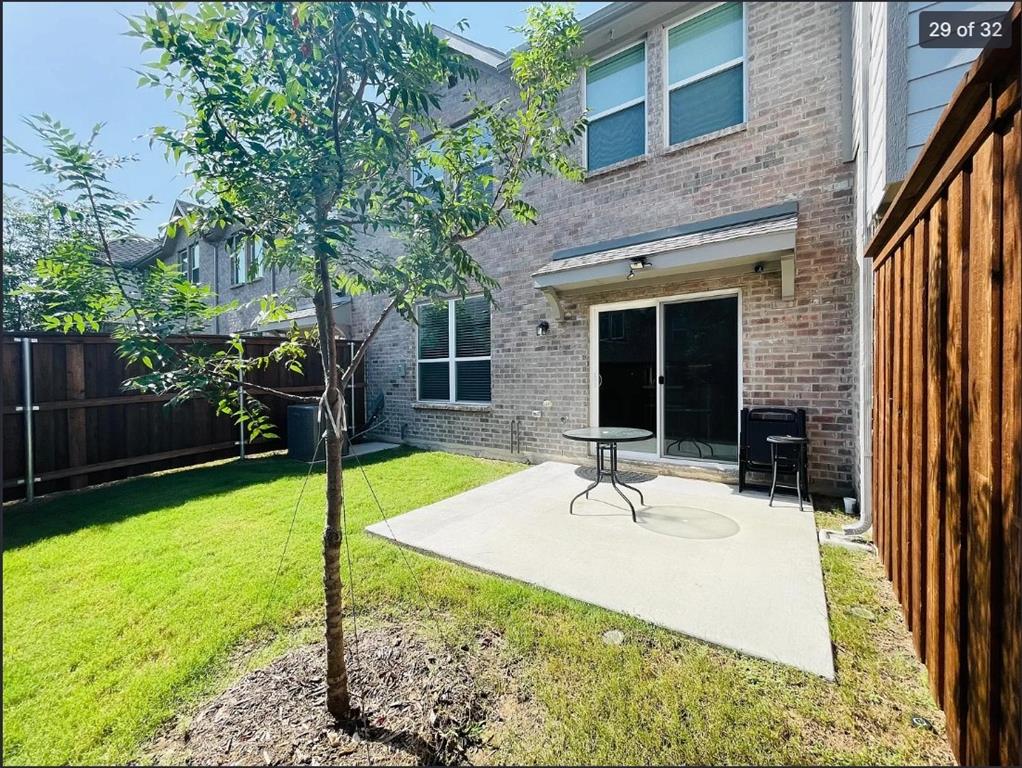 1009 Emil Place Allen, TX 75013 - Photo 28 of 31 a swimming pool with some potted plants and a large tree
