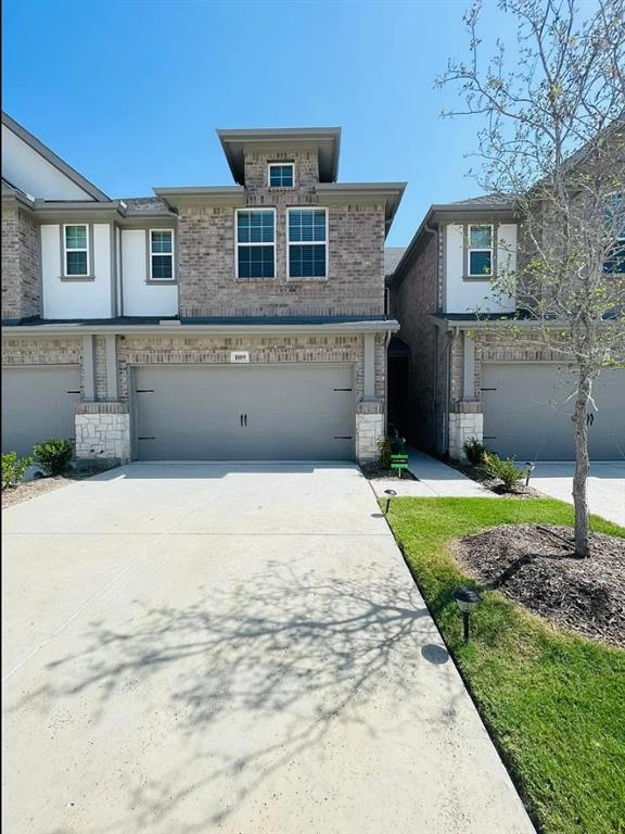 1009 Emil Place Allen, TX 75013 - Photo 3 of 31 a front view of a house with a yard