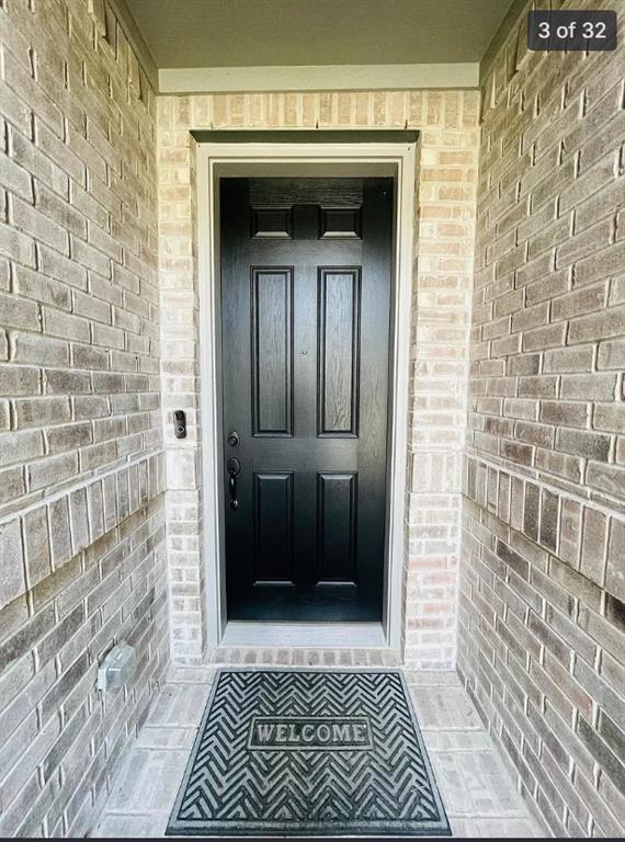 1009 Emil Place Allen, TX 75013 - Photo 4 of 31 a view of a wooden door of a house