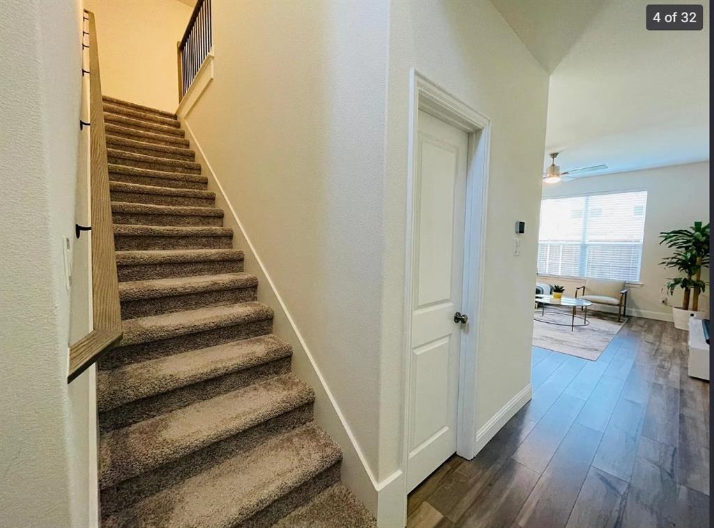 1009 Emil Place Allen, TX 75013 - Photo 5 of 31 a view of a hallway with wooden floor and entryway