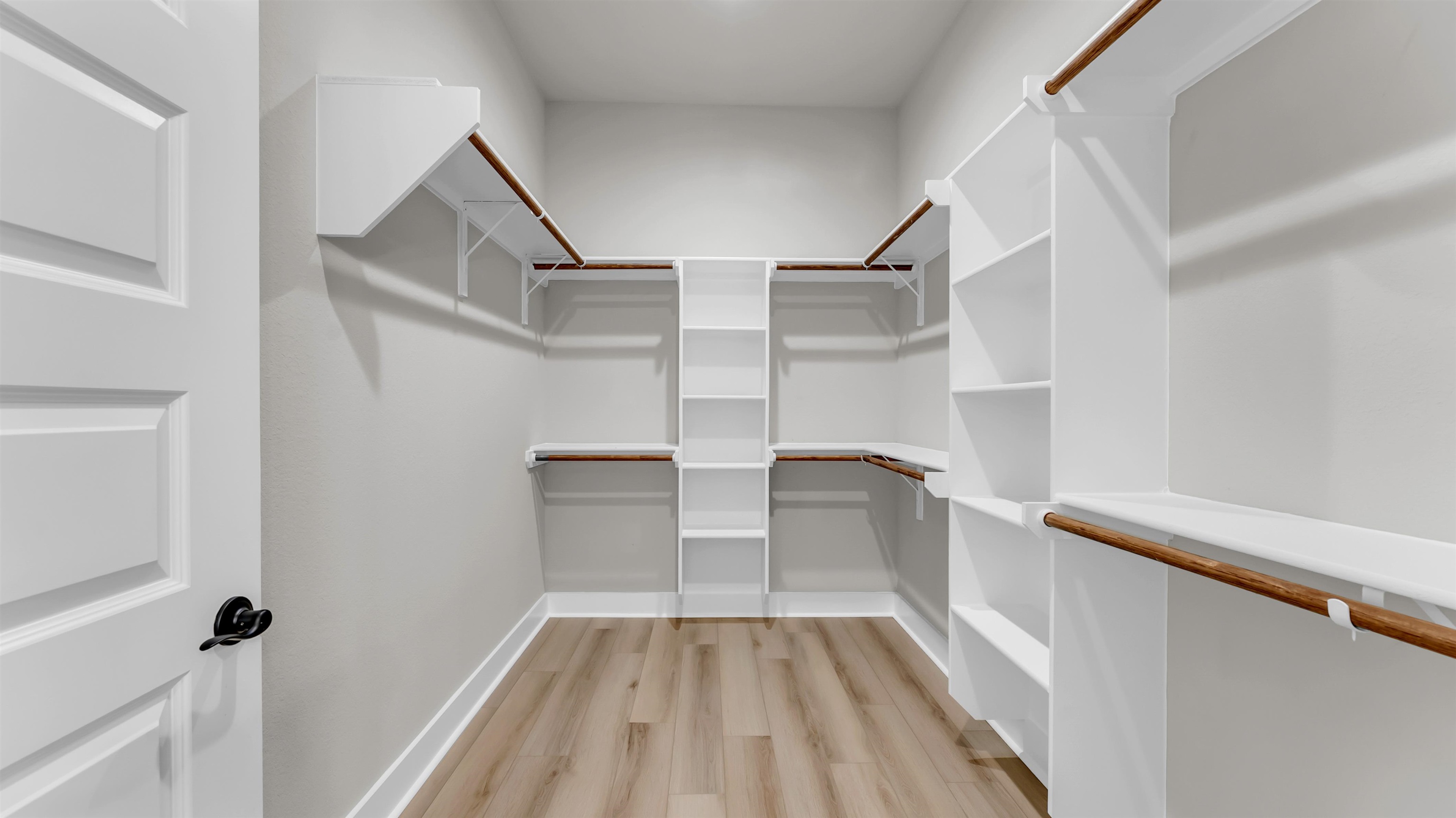 373 Prarie Point Road Bertram, TX 78605 - Photo 15 of 25 a view of walk in closet with empty racks