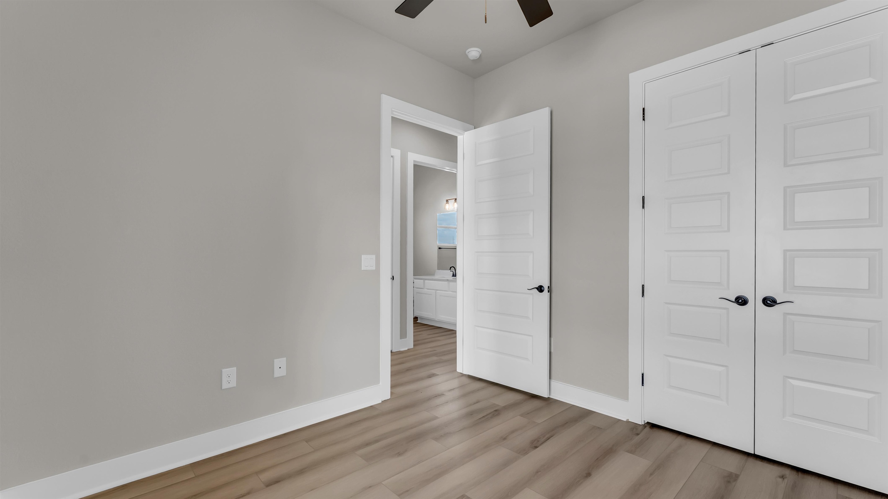 373 Prarie Point Road Bertram, TX 78605 - Photo 19 of 25 a view of an empty room with wooden floor