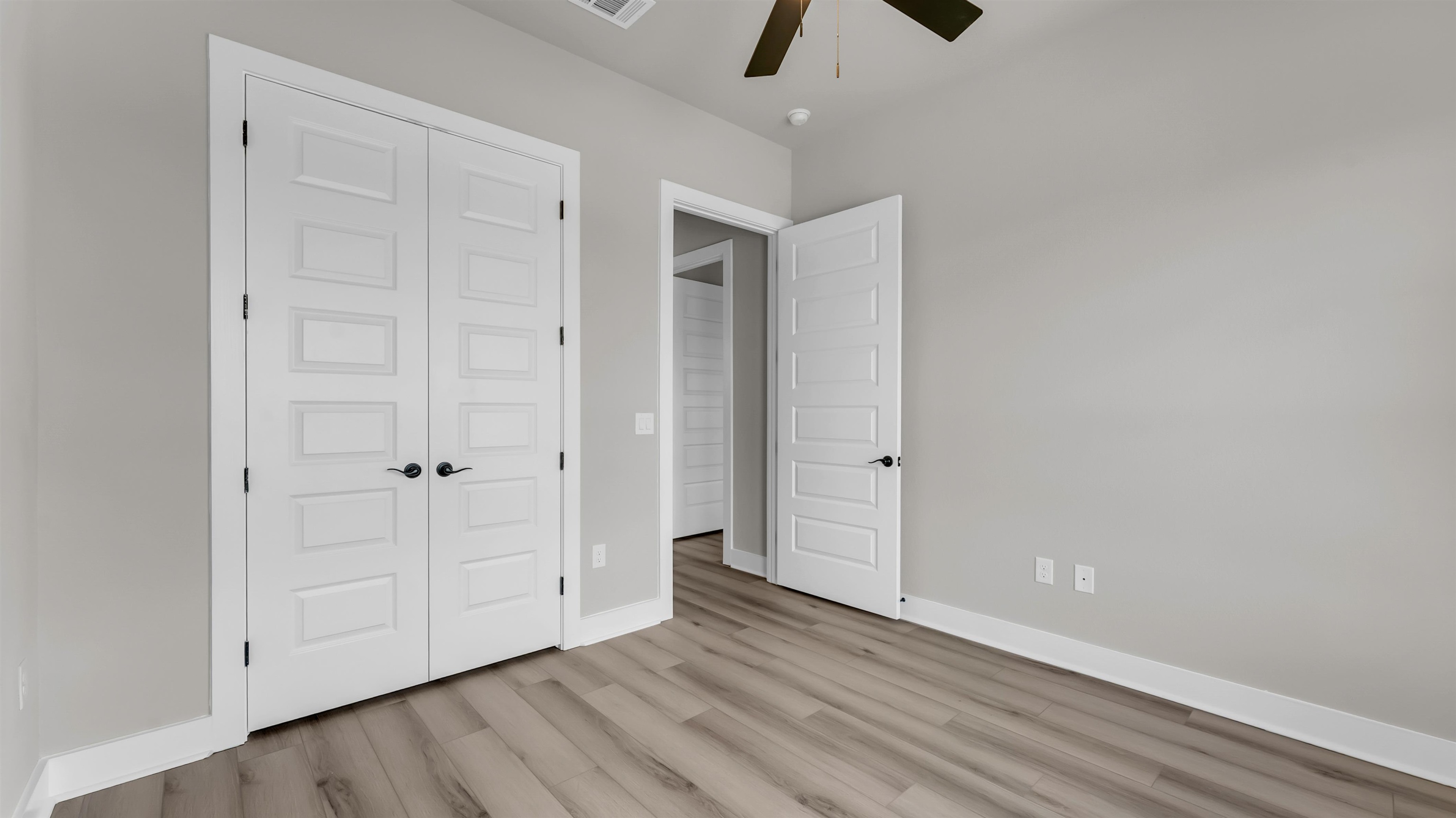 373 Prarie Point Road Bertram, TX 78605 - Photo 20 of 25 a view of an empty room with wooden floor